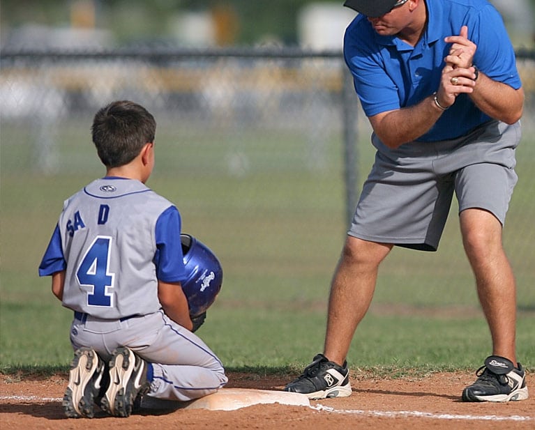 What can coaches do to prevent injury in child athletes?