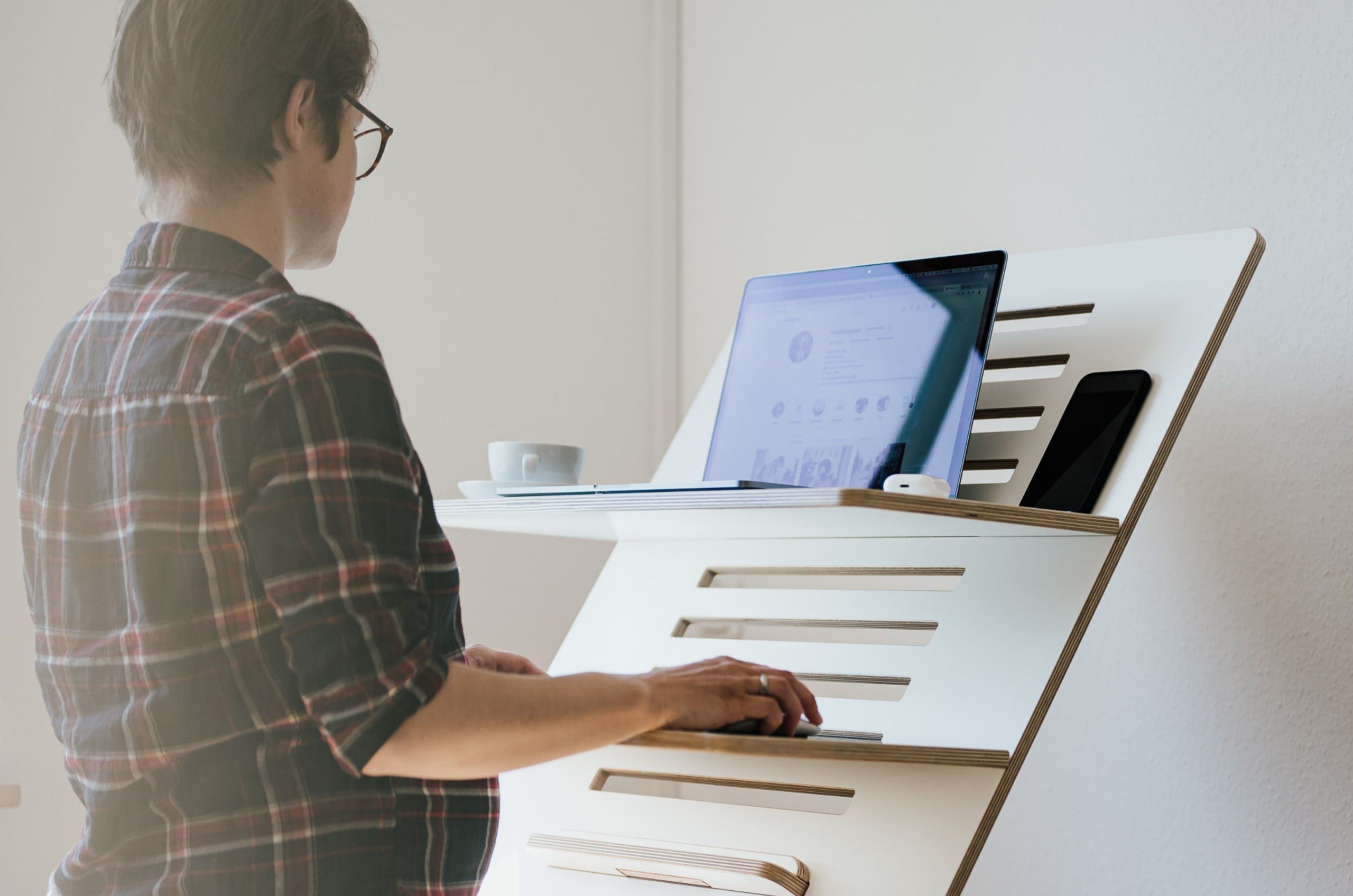 use a stand-up desk to reduce pain from sitting too much